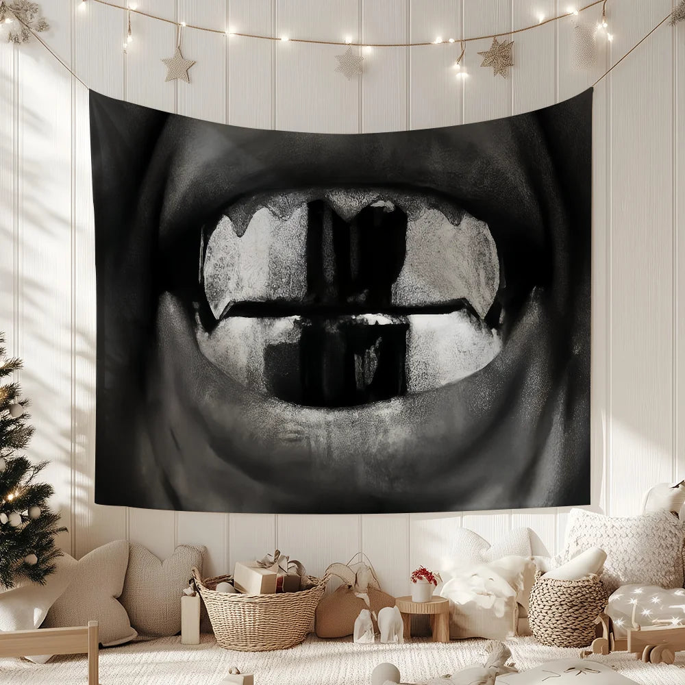 A large black banner featuring a stylized eye design hangs on a white wall with string lights and cozy decor.