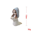 Handcrafted Virgin Mary crochet doll with a light blue hooded garment and brown hair