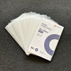 A stack of 50 clear hard card sleeves for trading cards is displayed on a dark gray surface.