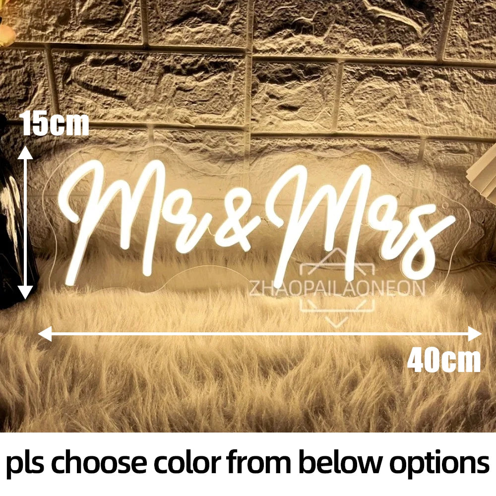A glowing neon sign spelling out Mr & Mrs on a textured wall with golden fur carpeting.