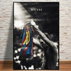 A black and white photo of Lionel Messi celebrating with a football, titled Messi.