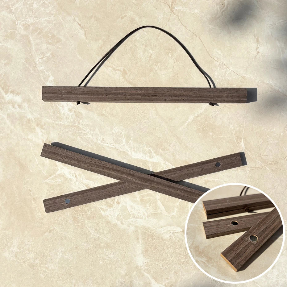 A natural teak wood magnetic poster frame for wall art display shown in two configurations.