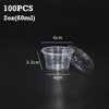 A set of 100 disposable clear plastic sauce cups with lids shown next to a measurement scale.