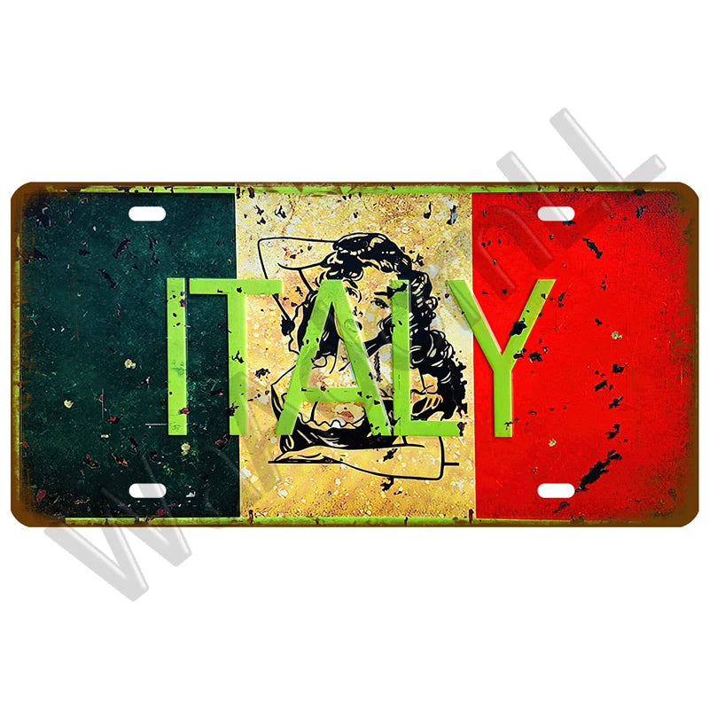A vintage metal tin sign featuring the Italian flag colors green, white, and red with the word ITALY in yellow text.