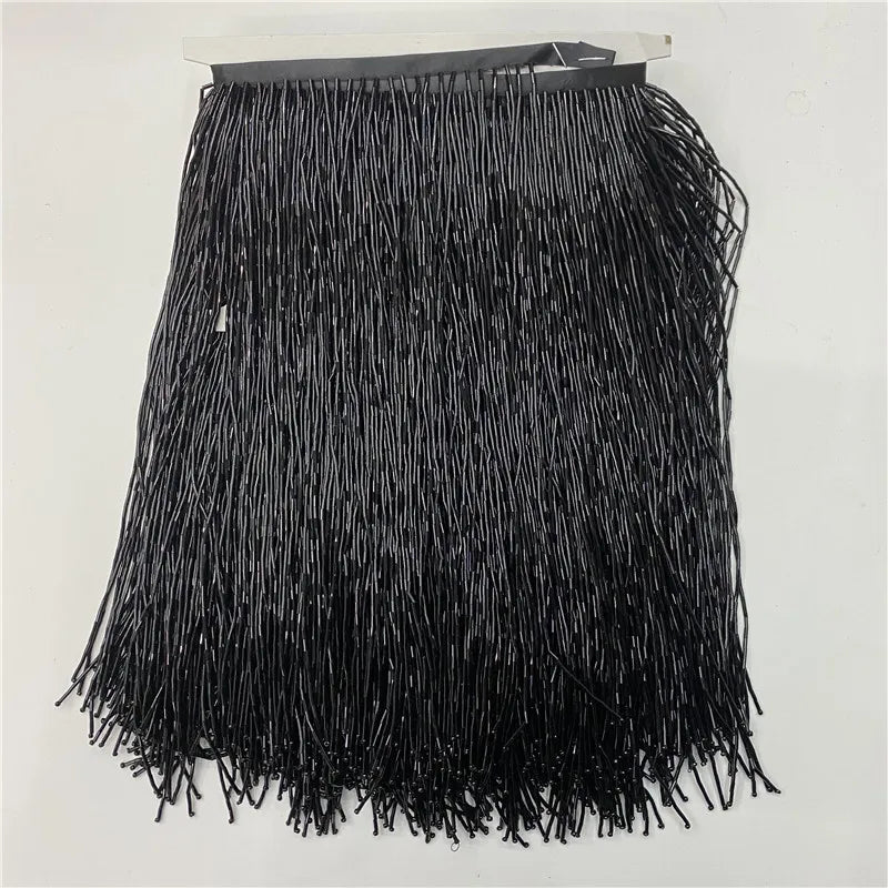 Black beaded tassel fringe trim used for curtains and DIY projects