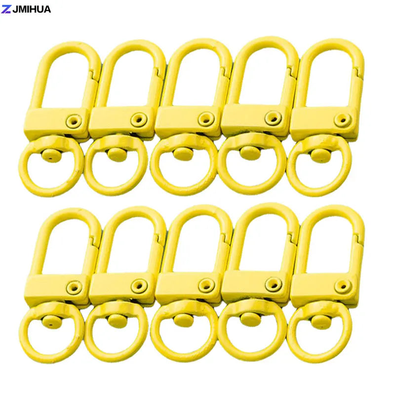 A set of yellow lobster clasp hooks for jewelry making and DIY crafts