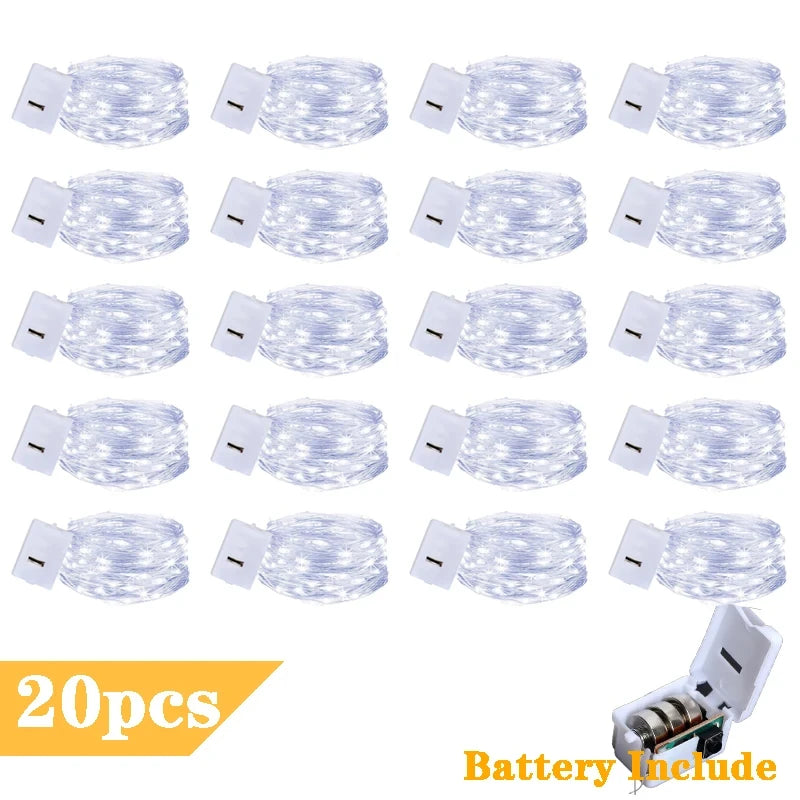 A pack of twenty battery-powered fairy lights with copper wire, each featuring 30 LEDs and 3 meters of wire.