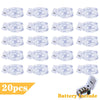 A collection of twenty battery-operated copper wire fairy lights packaged for sale.