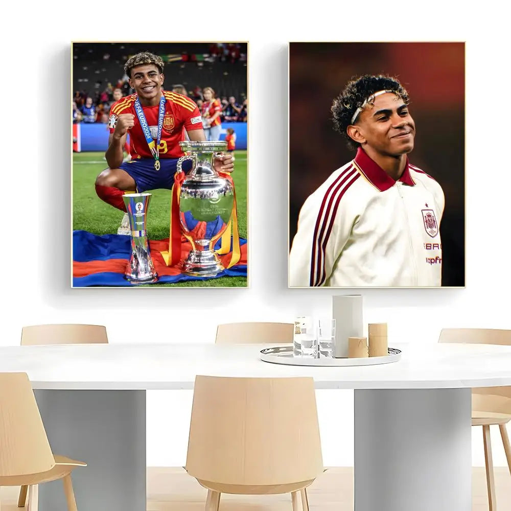 A pair of framed posters featuring Lamine Yamal celebrating a football victory.
