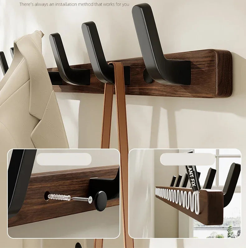 A walnut wood coat rack with eight hooks and a storage shelf mounted on a wall.
