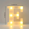 A glowing yellow LED letter E sign made of translucent acrylic for room or party decor.