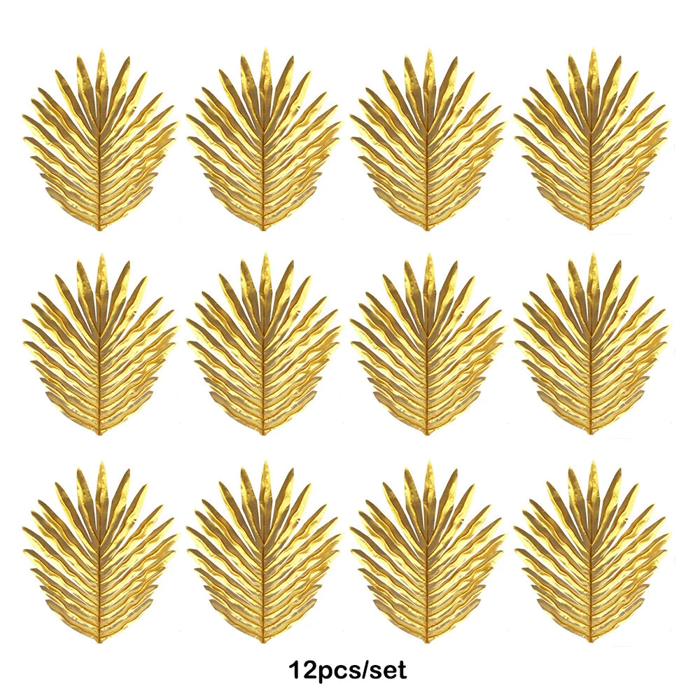 Twelve golden artificial tropical palm leaves used for party decoration
