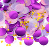 A colorful mix of round tissue paper confetti dots in shades of purple, pink, and lavender.