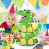 A green dinosaur-shaped 3-tier cupcake stand decorated for a kids party