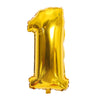 A shiny gold foil number balloon shaped like the numeral one.