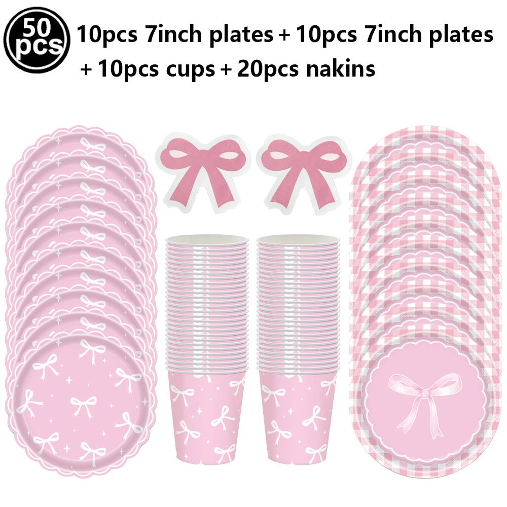 A set of pink disposable party tableware including 10 plates, cups, and napkins with bow designs.