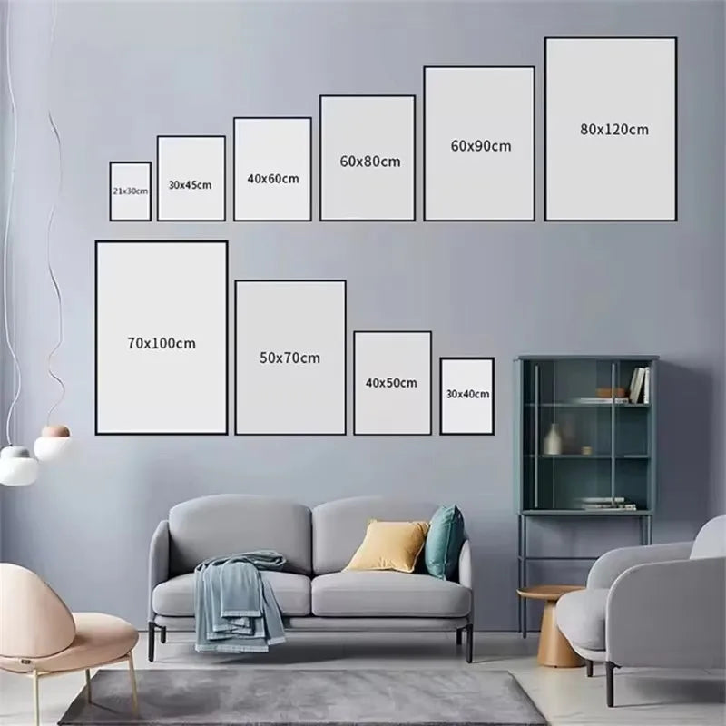 Mur galerie avec des tirages sur toile noir et blanc de différentes tailles sur un mur gris.