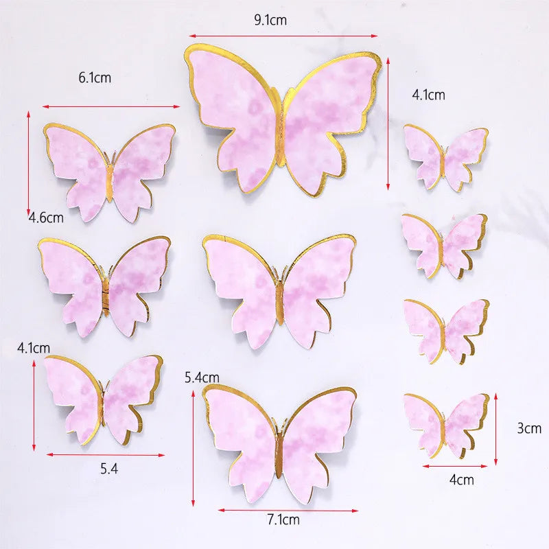 Set of pink and gold butterfly cake toppers for parties and baking