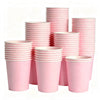 A stack of pink disposable paper cups in various sizes and heights.