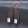 A brown leather car seat headrest hook with silver alloy cores for securing items.