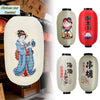 Japanese paper hanging lantern featuring a woman in blue and pink attire with a traditional design