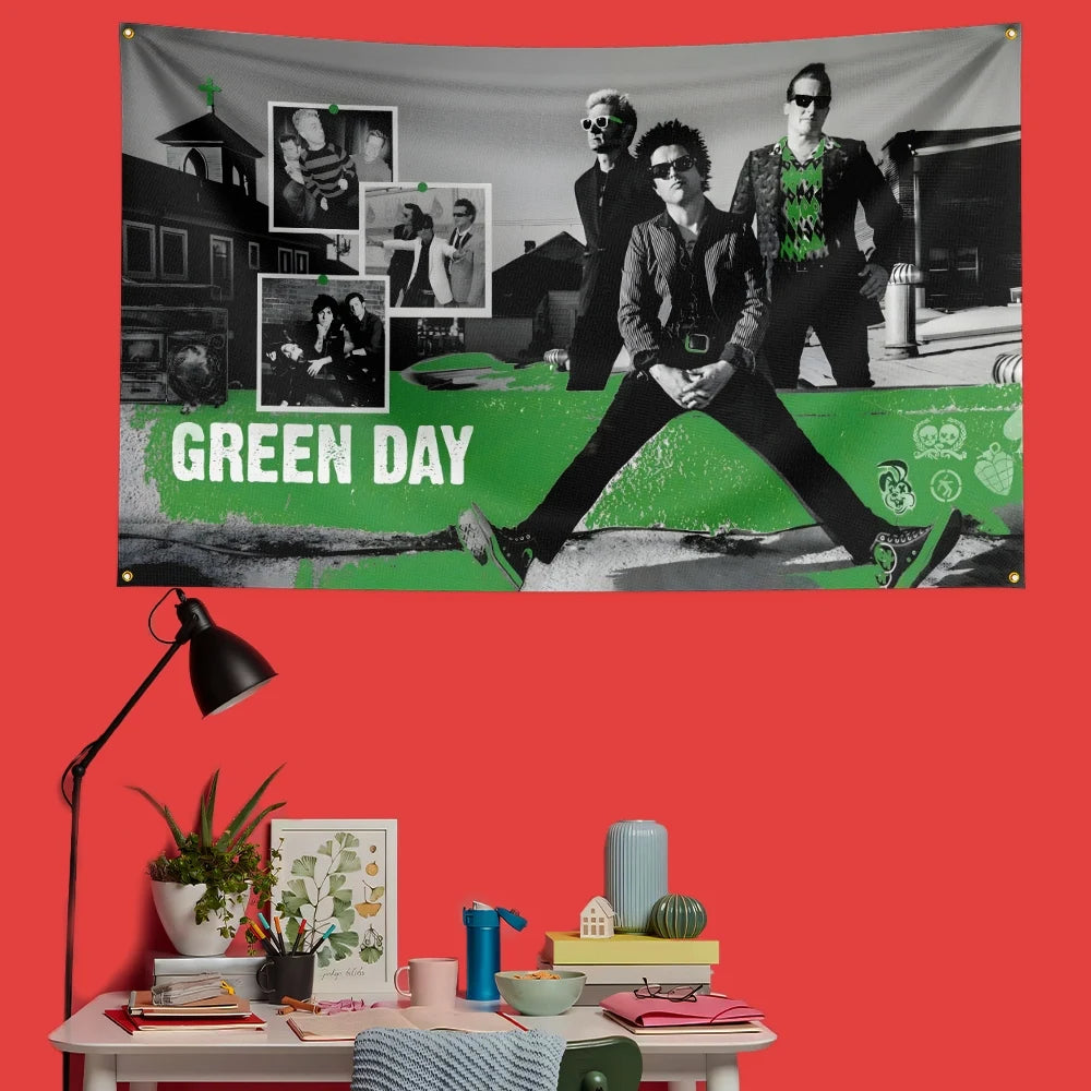 A decorative banner featuring a black and white photo collage of Green Day members against a green background.