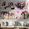 A tapestry featuring characters from the K-On! anime series in various poses and colors.