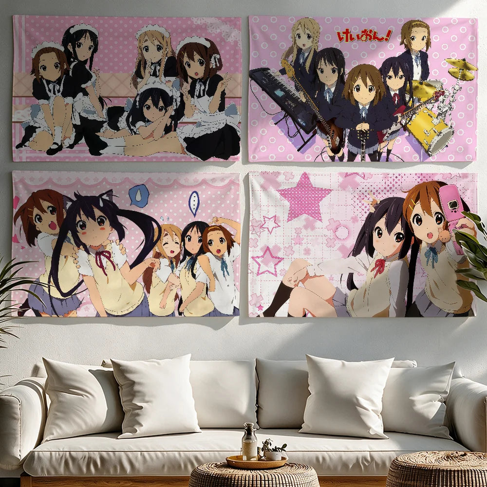 A tapestry featuring characters from the K-On! anime series in various poses and colors.