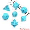 A set of various geometric crystal shapes in blue turquoise including a pyramid, cube, sphere, and star.
