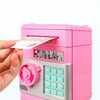 A pink automatic induction roll money system device with a keypad and slot for depositing banknotes.