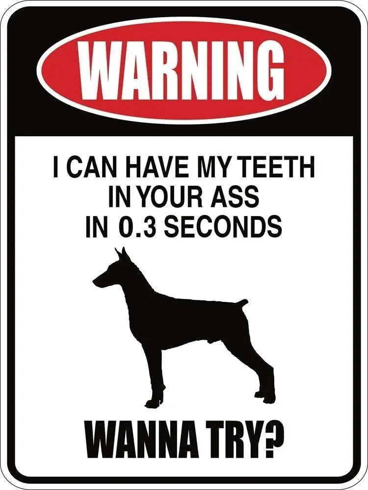 A warning sign featuring text and a silhouette of a dog.