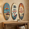 Decorative wooden surfboard wall art featuring tropical scenes and summer themes.