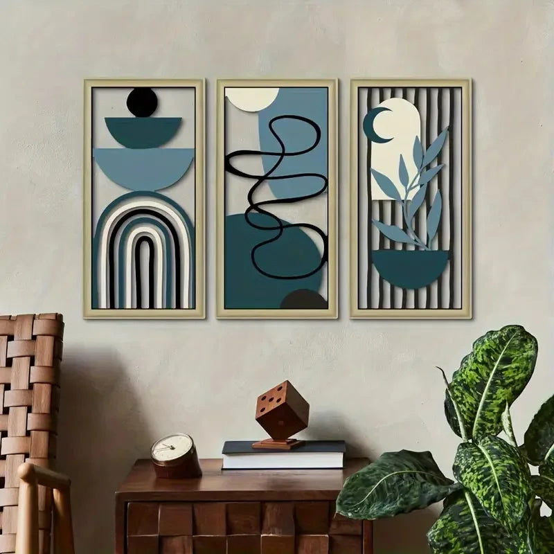 Drei gerahmte abstrakte Kunstwerke mit geometrischen Formen und welligen Linien in gedämpften Blautönen, Grau und Beige.