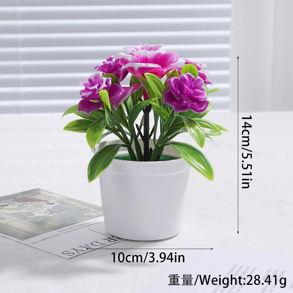 A potted artificial bonsai tree decoration with vibrant purple and white flowers on a white background.