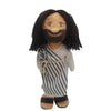 A plush doll depicting Jesus and Mary with dark hair and a striped shirt.