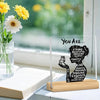 Acrylic positive affirmation desk decor featuring a silhouette of a woman with text like strong beautiful amazing talented an