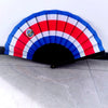 A handheld folding fan featuring a design inspired by the country flag, with red, white, and blue stripes.