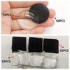A hand holds clear and black decorative refrigerator magnets, showing various sizes and quantities.