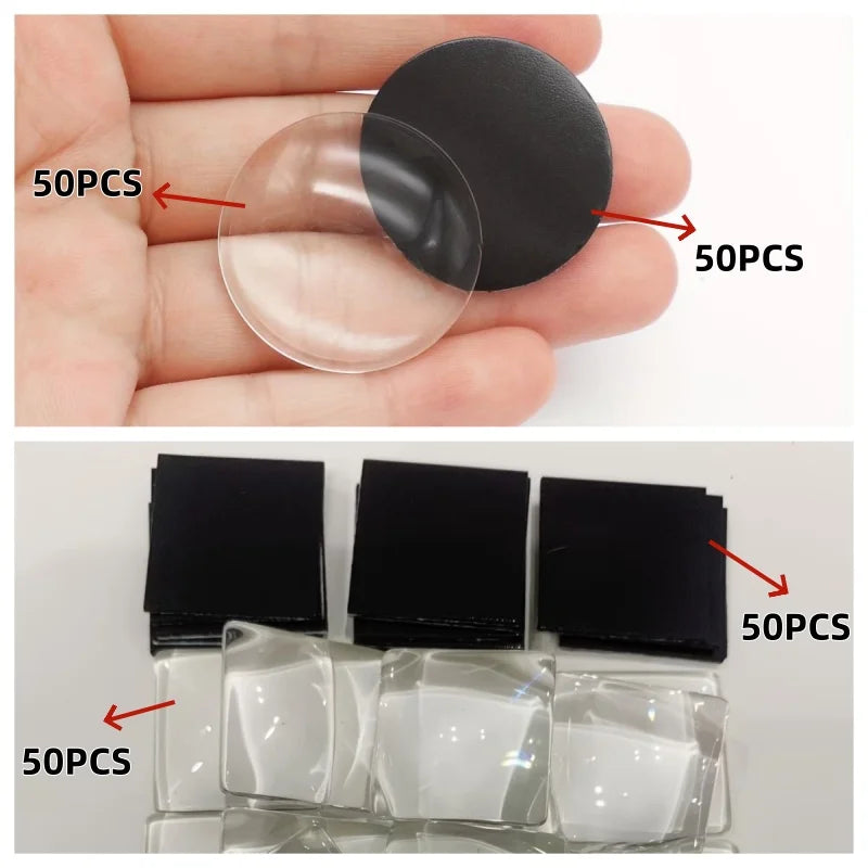 A hand holds clear and black decorative refrigerator magnets, showing various sizes and quantities.