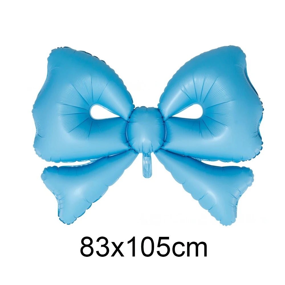 Light blue Mylar balloon bow shaped like a cupcake topper for parties
