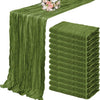 A set of ten terracotta semi-sheer cheesecloth table runners in a moss green color.