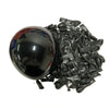 A black latex balloon is shown next to a pile of black latex balloons.