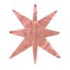A pink star burst foil balloon with pointed arms for party decoration.