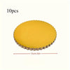 A round yellow disposable cake plate with a scalloped edge, shown flat.