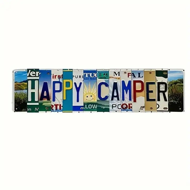 A horizontal display of vintage metal signs spelling out HAPPY CAMPER