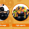 Black ceramic witch cauldron mugs filled with Halloween treats and candies