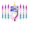 Five birthday candles with a gradient purple and blue sparkle design, topped with a crown.
