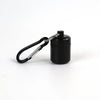 Black mini waterproof pill organizer keychain with a metal keyring