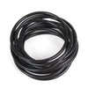 A coil of black glow-in-the-dark silicone bracelets