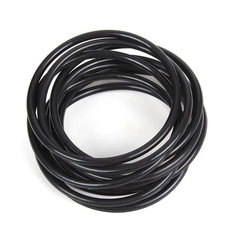 A coil of black glow-in-the-dark silicone bracelets